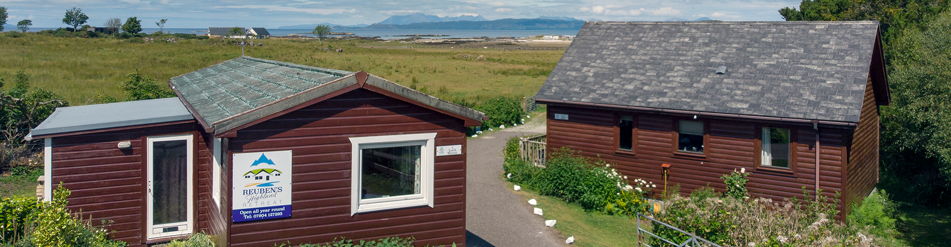 Entrance to Reuben's Highland Retreat with the Isle of Skye in the background